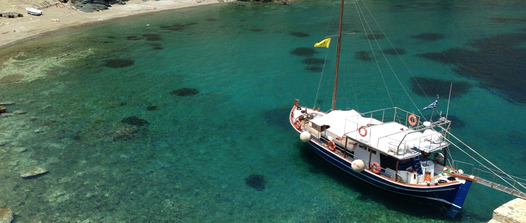 A tiny stone pier sticks out into Kyra Panagia's secluded bay