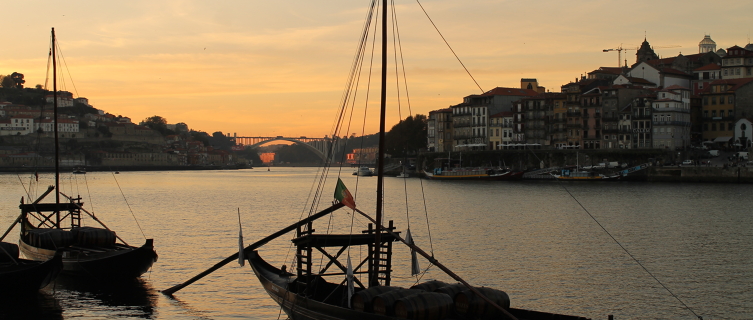 Barcos rabelos boats curtsy softly in slate-shaded swells