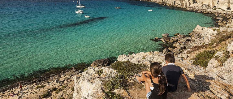 Expect warm blue water and plenty of sunshine in Sicily.