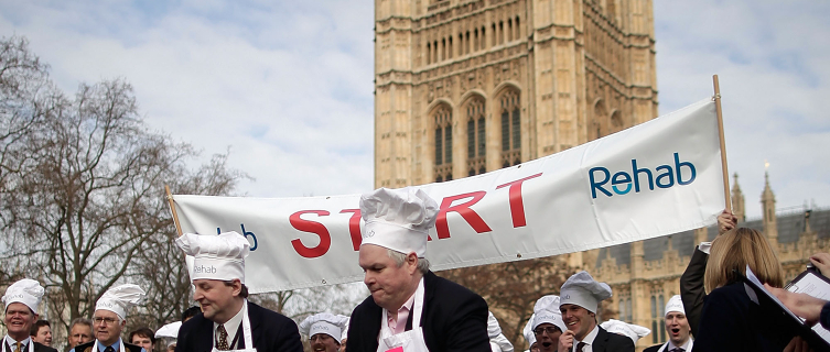Politicians toss up some pancakes at an annual Pancake Race